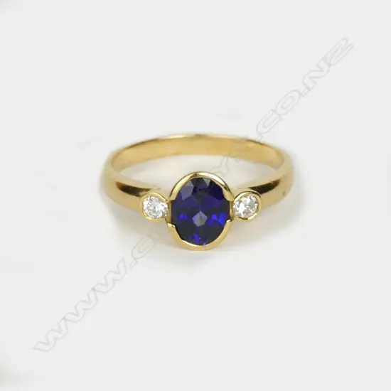 An 18ct sapphire and diamond ring