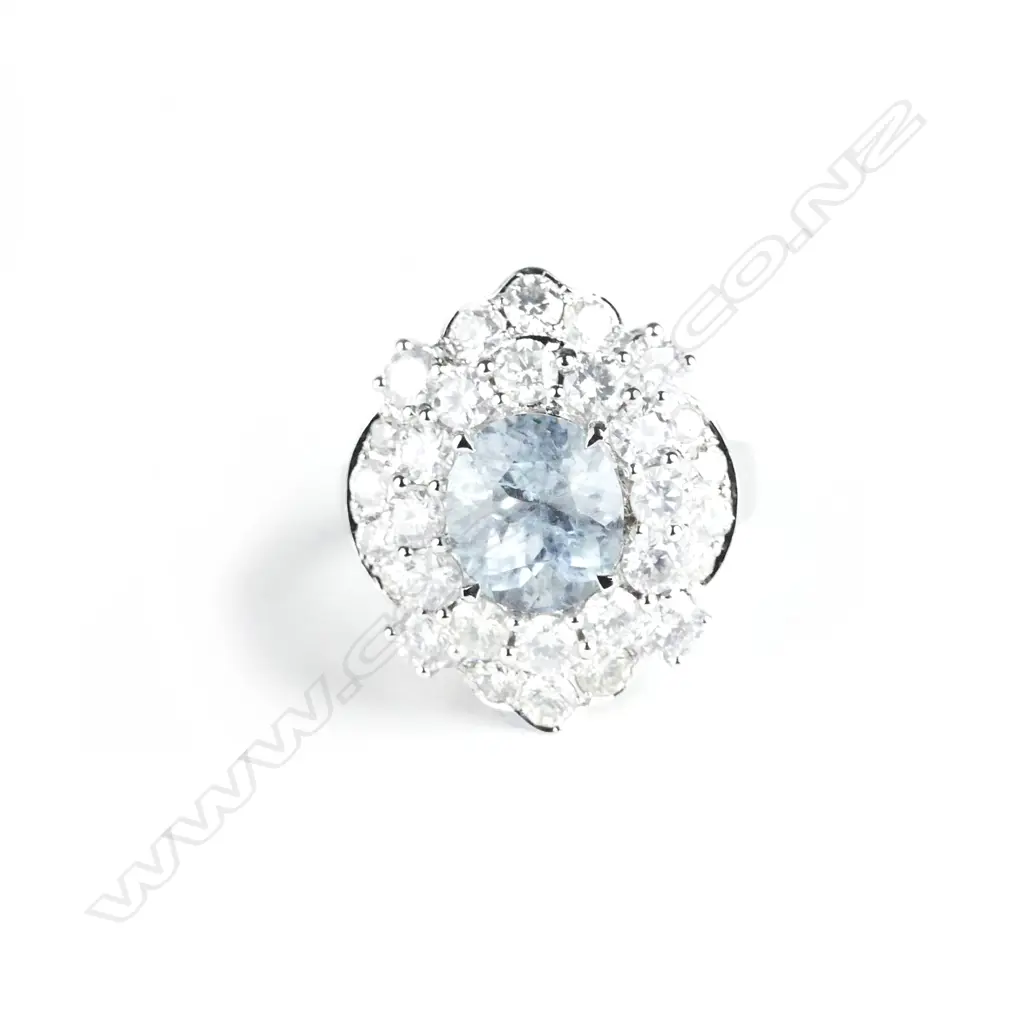 An impressive 14ct. white gold aquamarine and diamond dress ring Image 1++