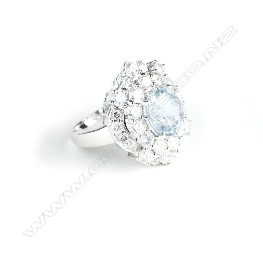 An impressive 14ct. white gold aquamarine and diamond dress ring Image 1++