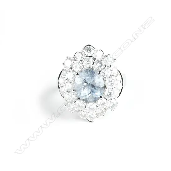 An impressive 14ct. white gold aquamarine and diamond dress ring
