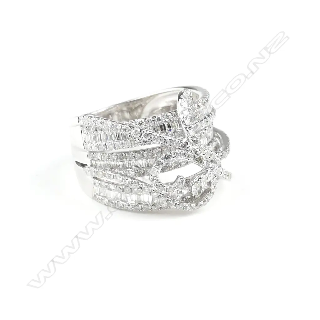 An 18ct. white gold and diamond dress ring Image 1++
