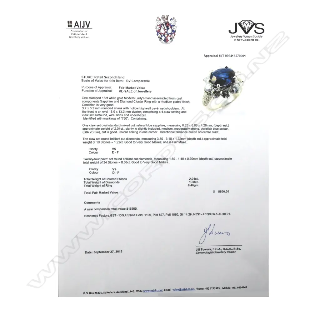 An 18ct white gold sapphire and diamond ring Image 1++