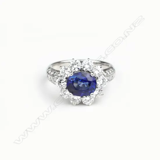 An 18ct white gold sapphire and diamond ring