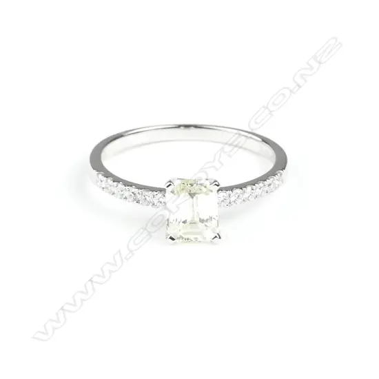 An 18ct. white gold and diamond solitaire ring