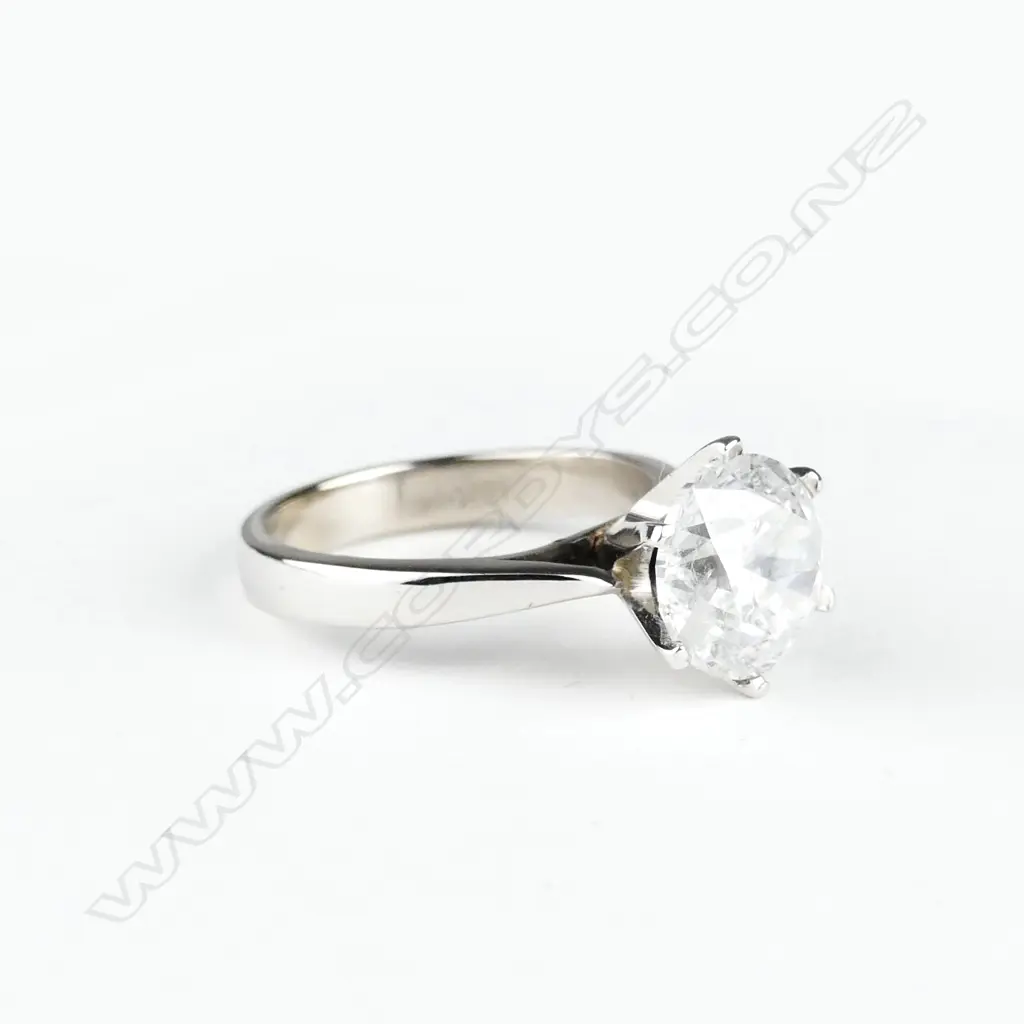 An 18ct. white gold and diamond solitaire ring Image 1++