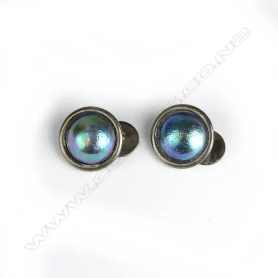 A pair of paua pearl and silver cufflinks