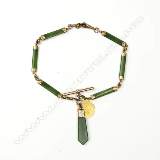 A c.1900 9ct. yellow gold and nephrite fob chain necklace
