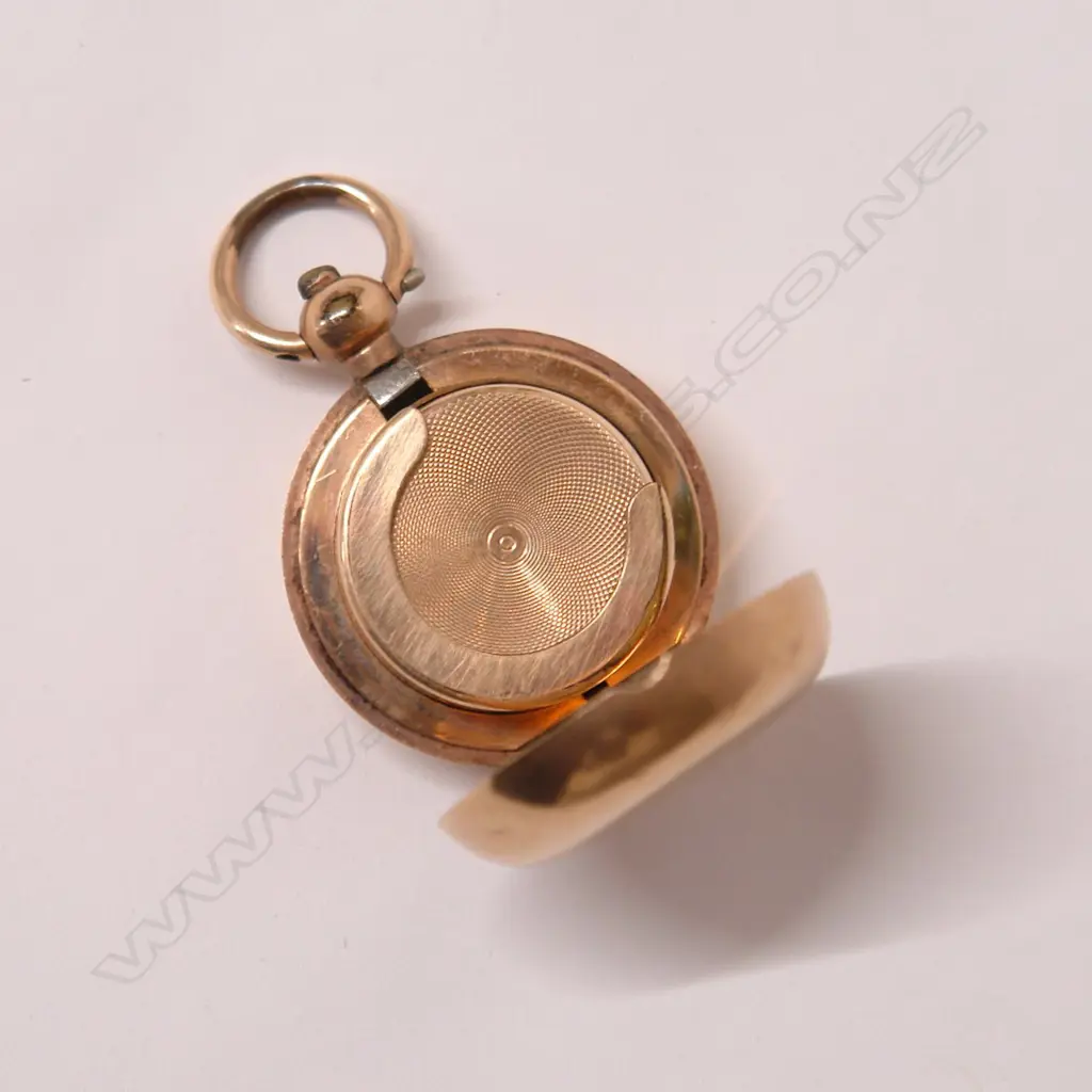 A c.1900 Dennison gold plated sovereign case Image 1++