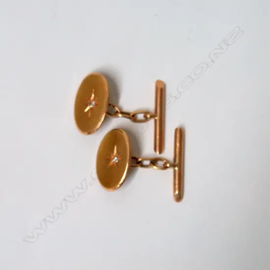 A pair of c.1900 15ct. yellow gold and diamond set gentleman's cufflinks