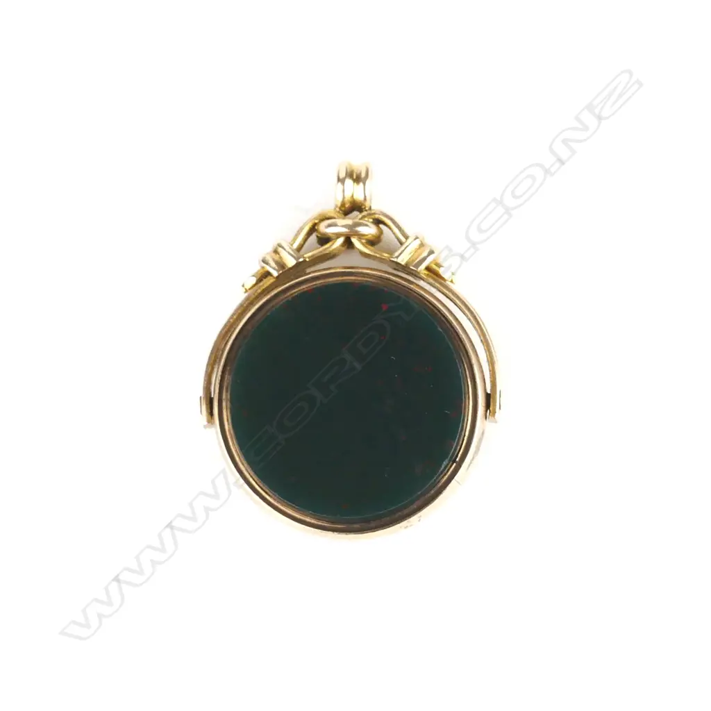 An Edwardian 9ct. rose gold fob spinner Image 1++