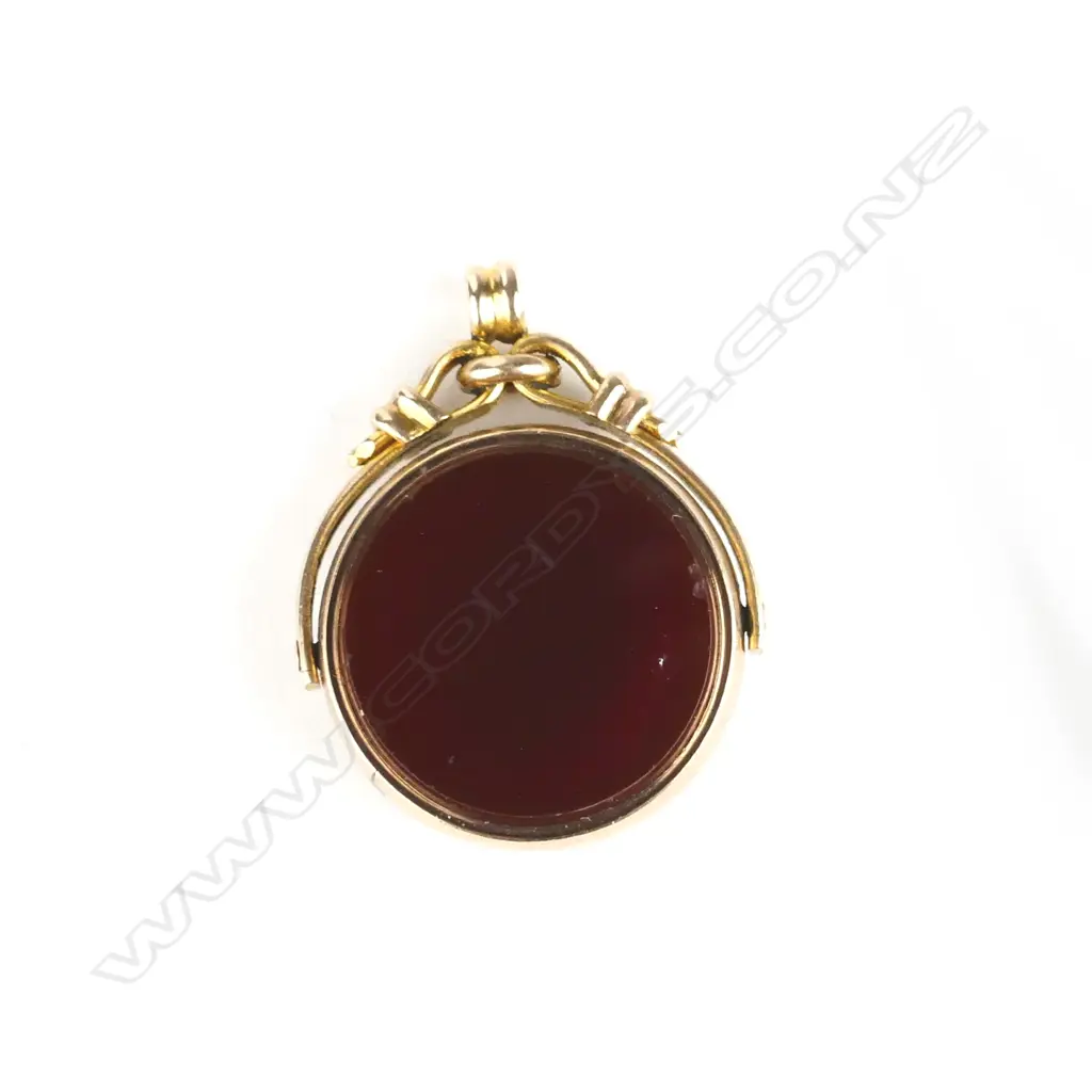 An Edwardian 9ct. rose gold fob spinner Image 1++
