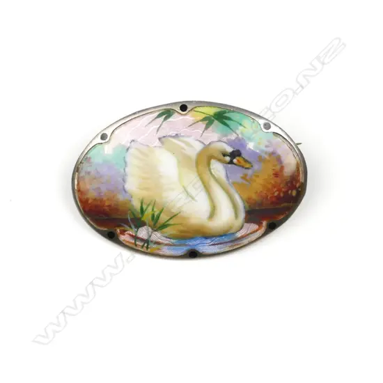 A vintage European silver and enamel oval panelled brooch