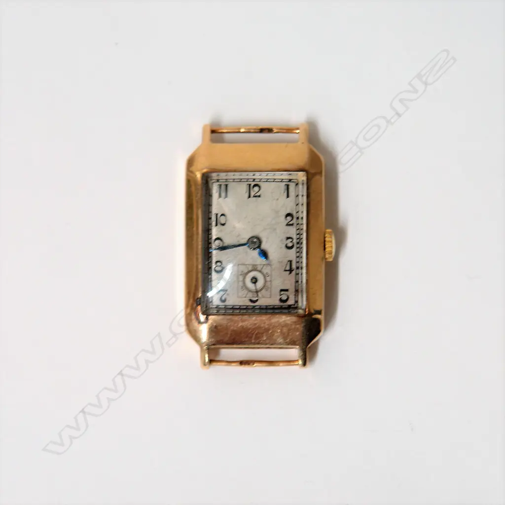 A 1920s 9ct. yellow gold 'Tank' form gent's wristwatch Image 1++