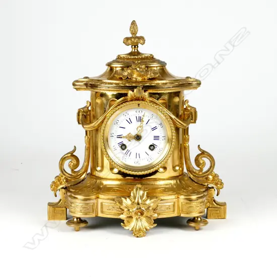 A French gilt bronze cased mantel clock