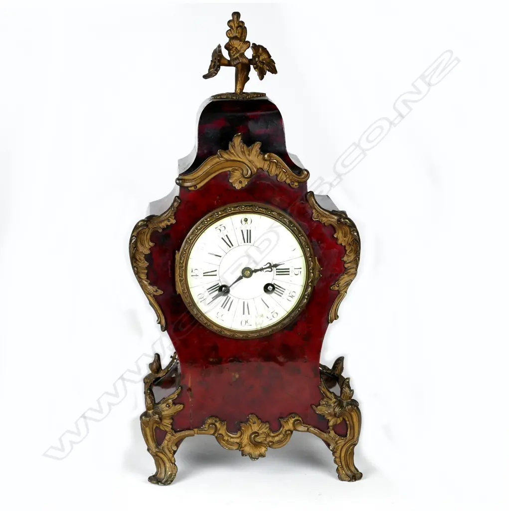 A French simulated red tortoiseshell cased mantel clock Image 1++