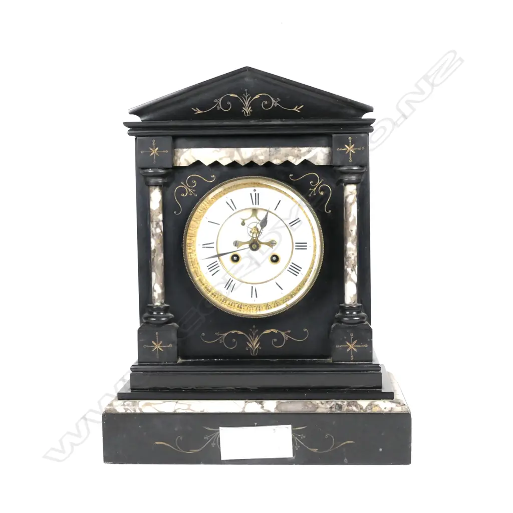 A Victorian black and mottled marble mantel clock of architectural style Image 1++
