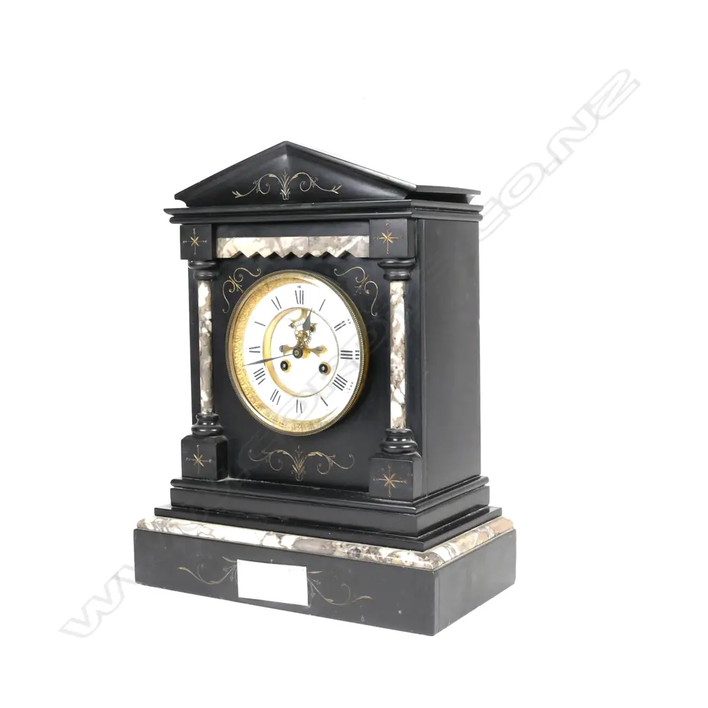 A Victorian black and mottled marble mantel clock of architectural style Image 1++