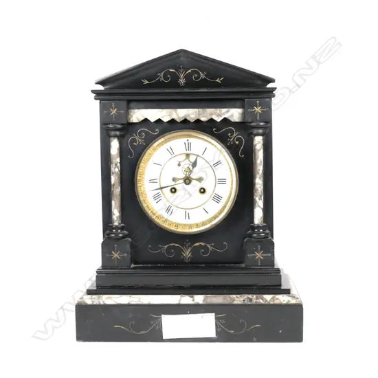 A Victorian black and mottled marble mantel clock of architectural style