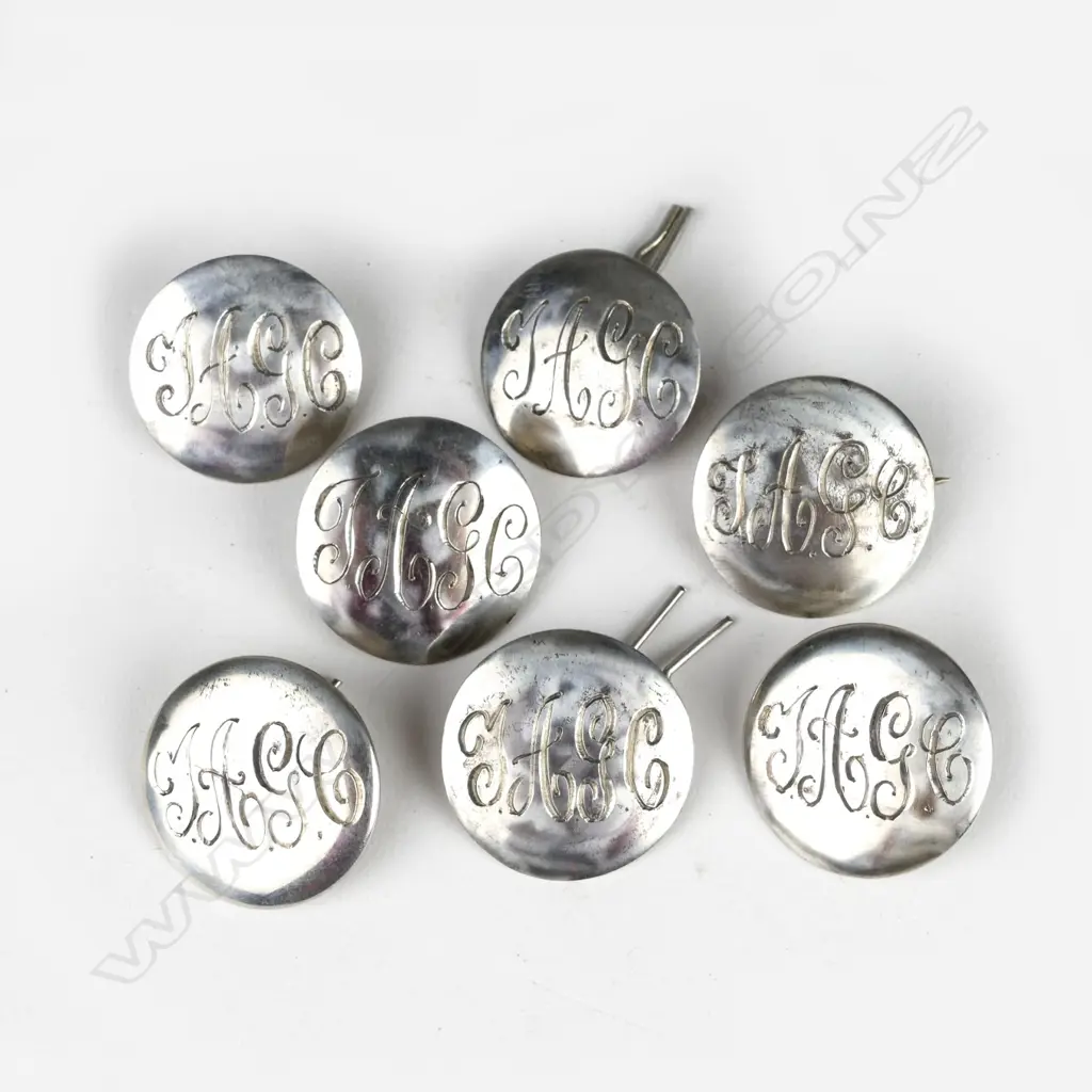 Six silver Kohn & Co. golf buttons Image 1++