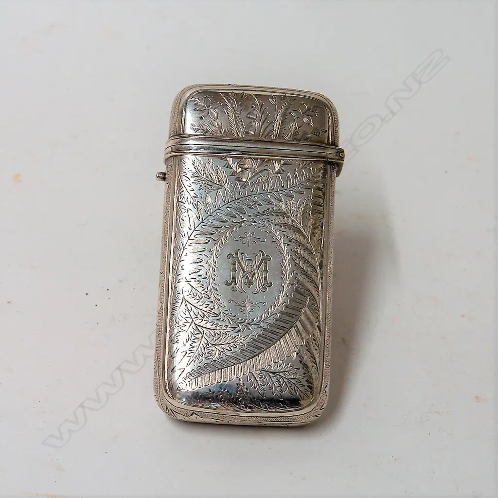 A late 19thC possibly N.Z. silver quality engraved cigar case Image 1++