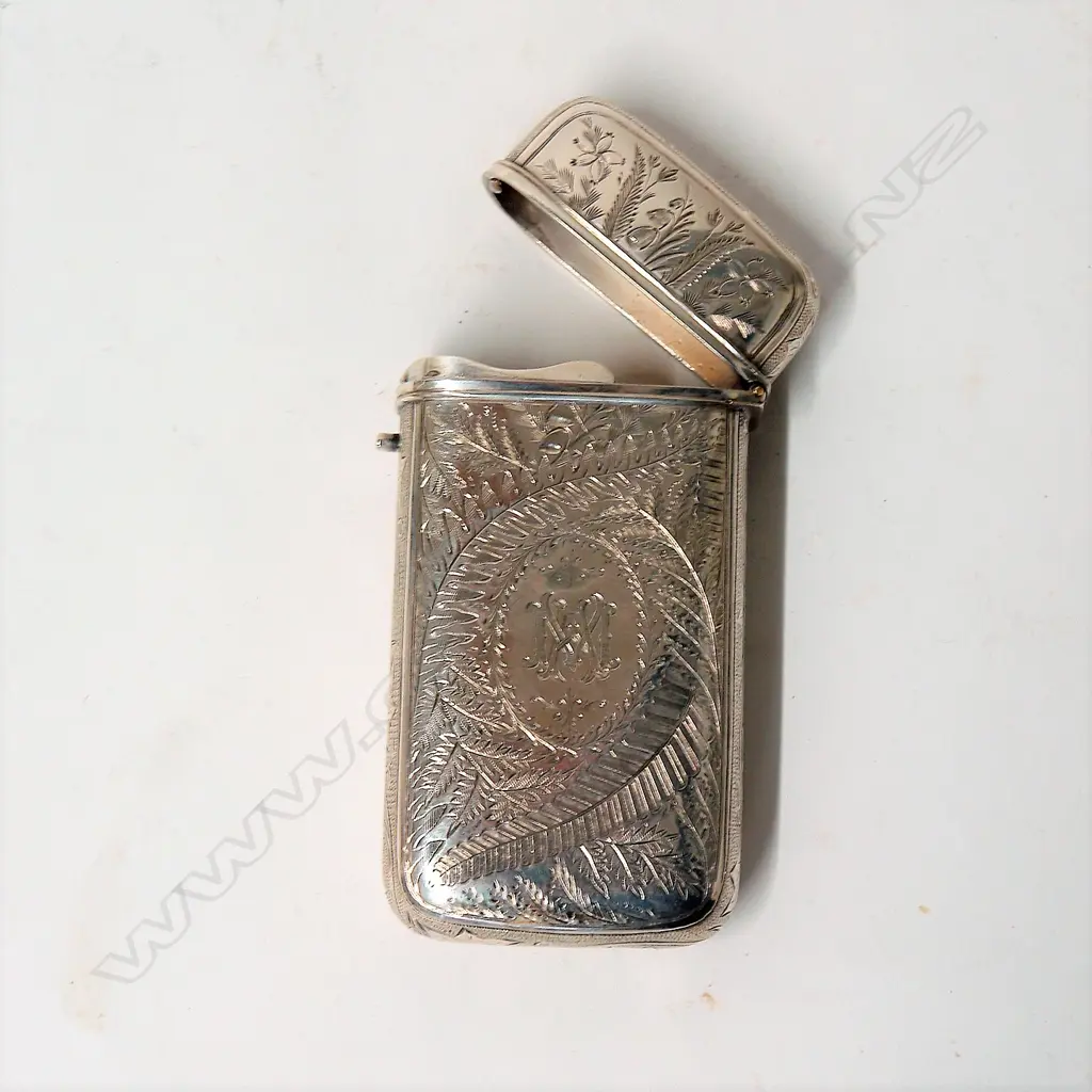 A late 19thC possibly N.Z. silver quality engraved cigar case Image 1++