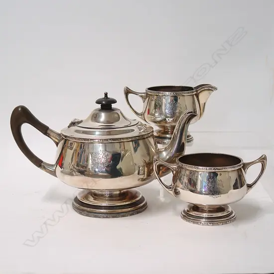 A c.1920 silver three-piece tea service