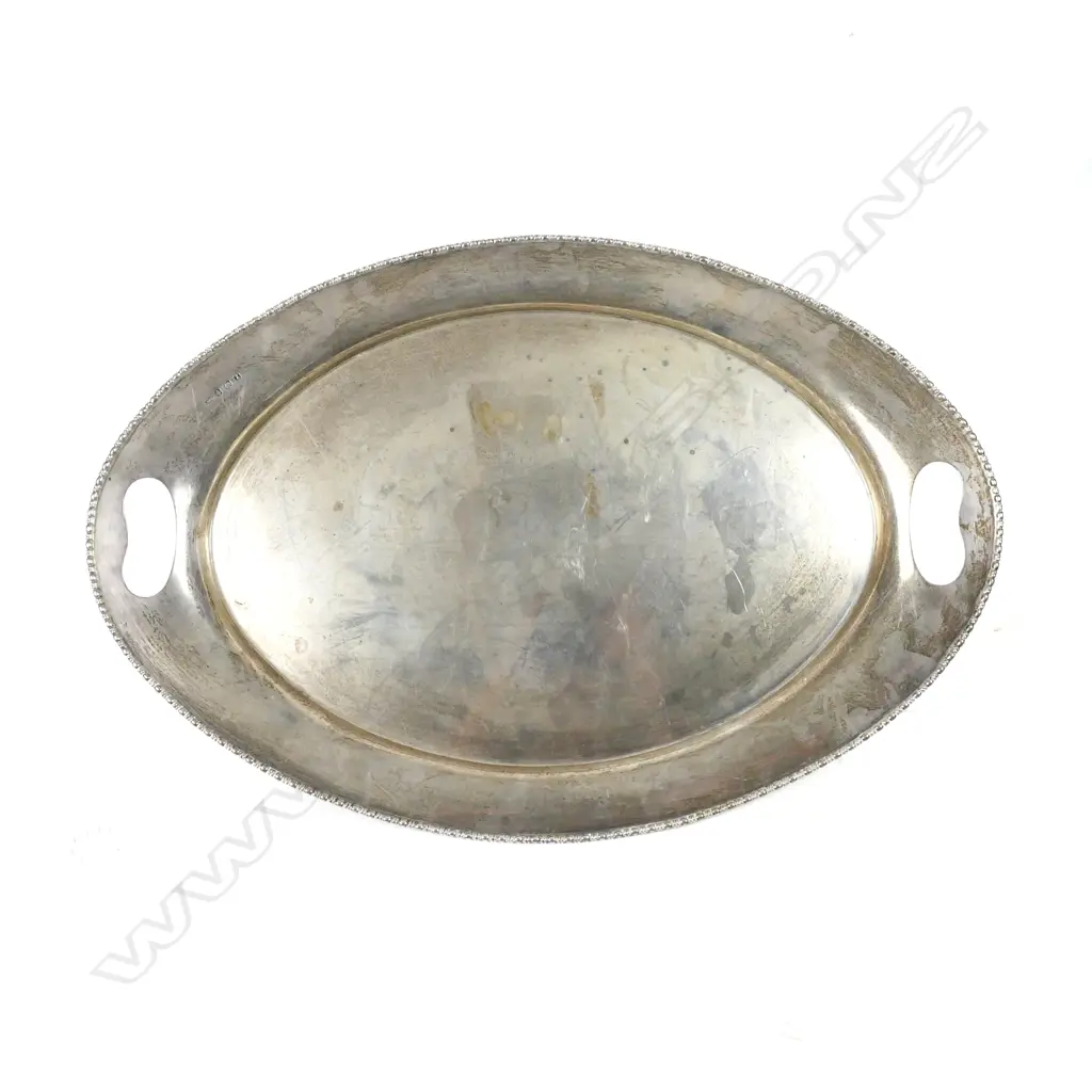 A large oval silver tray Image 1++