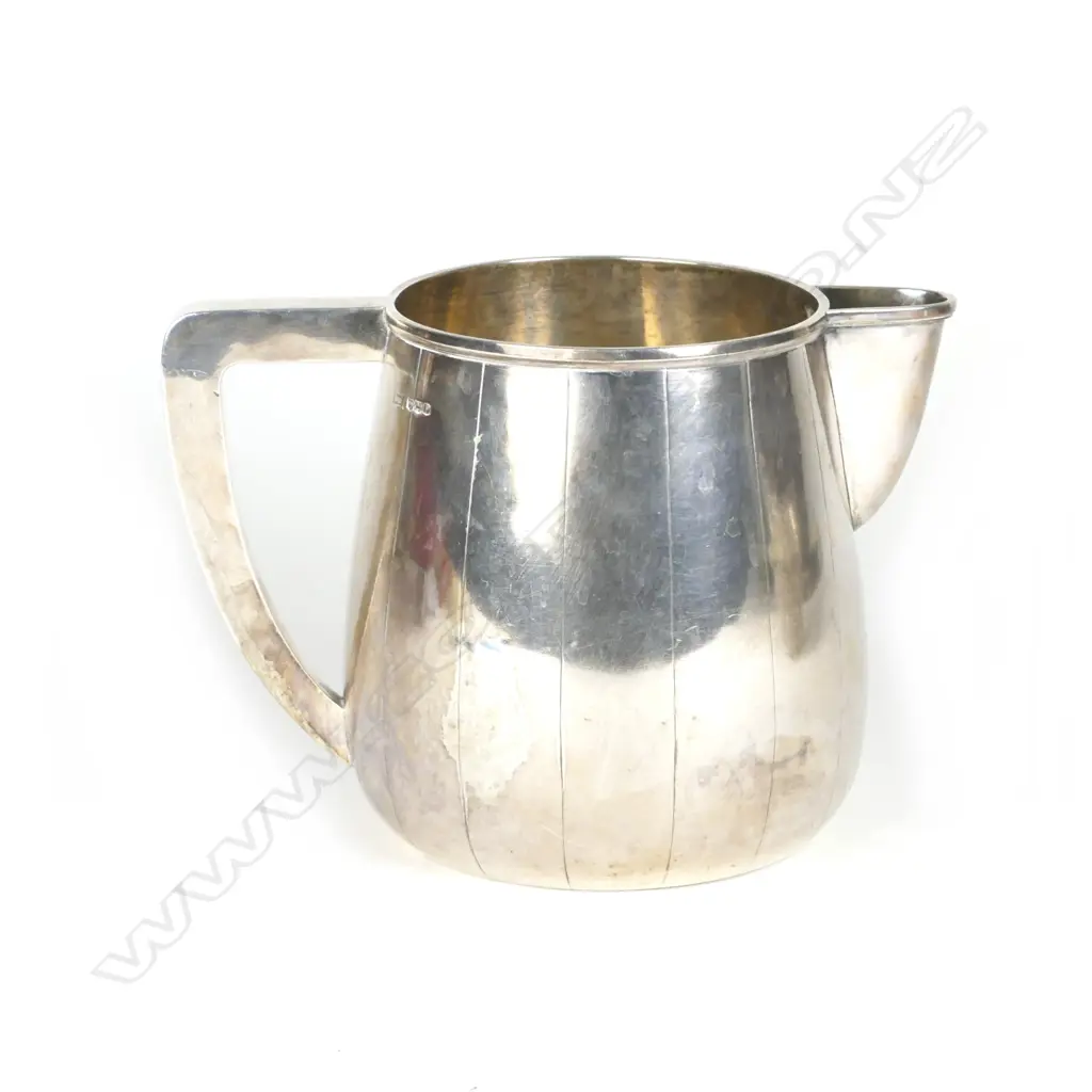 An impressive silver pitcher Image 1++
