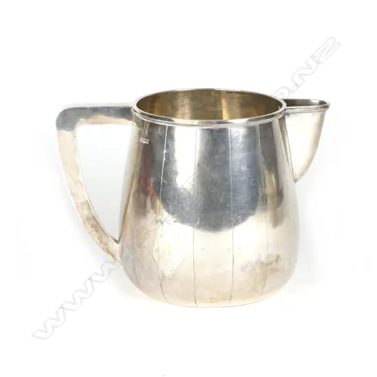 An impressive silver pitcher