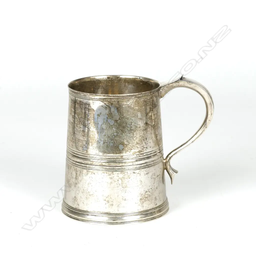 A silver mug Image 1++