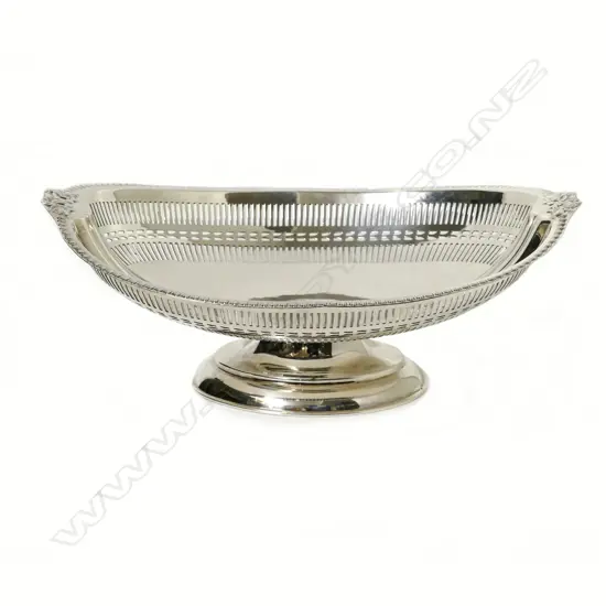 An oval silver footed bowl