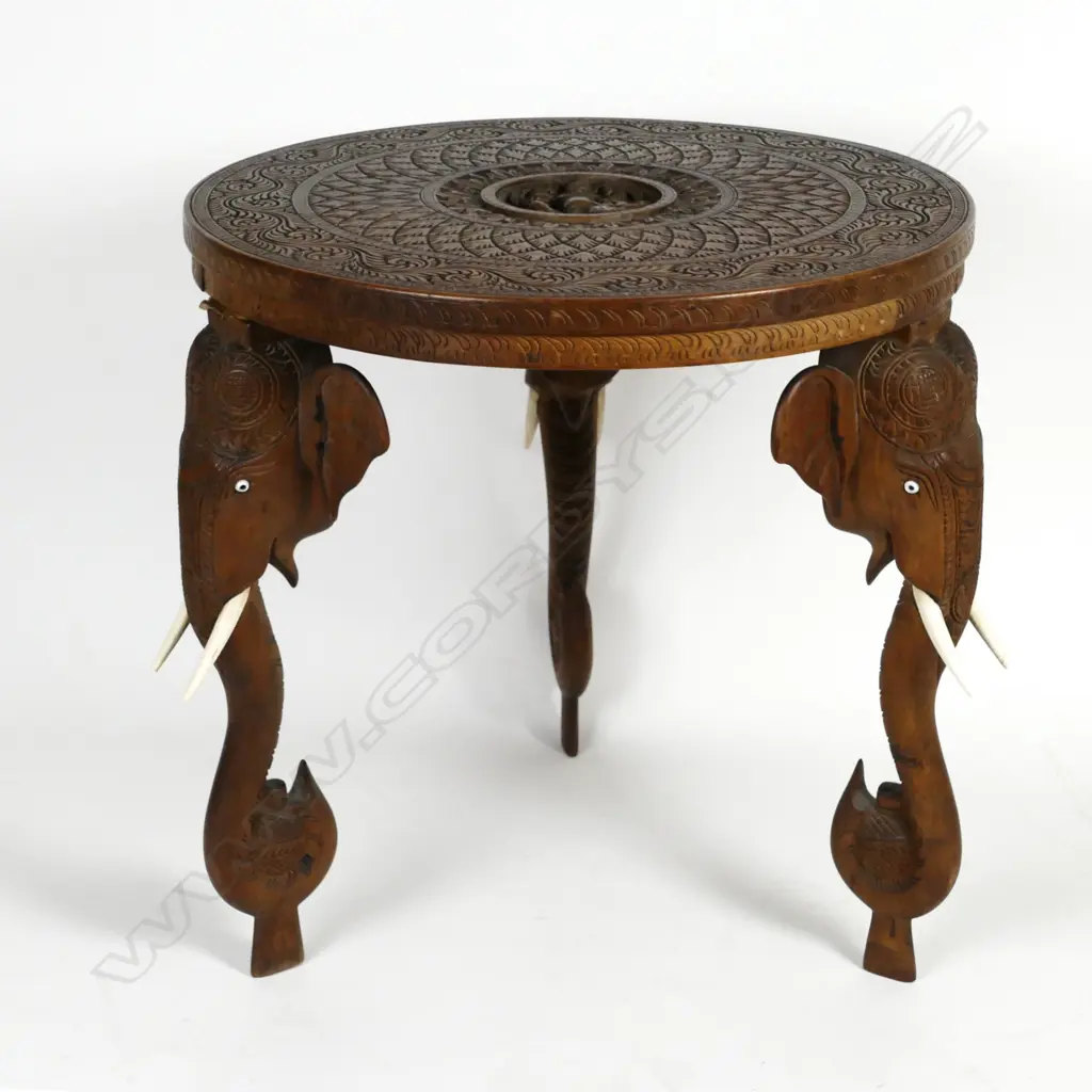 An Indian carved occasional table Image 1++