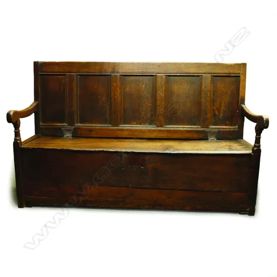 A George III country oak five panel back settle
