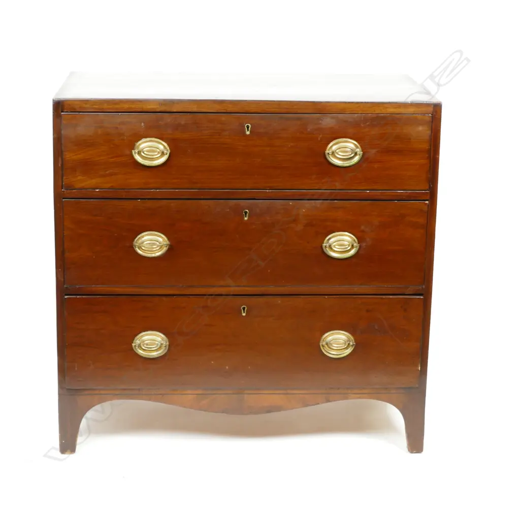 A small Georgian mahogany chest of three graduated full width drawers Image 1++