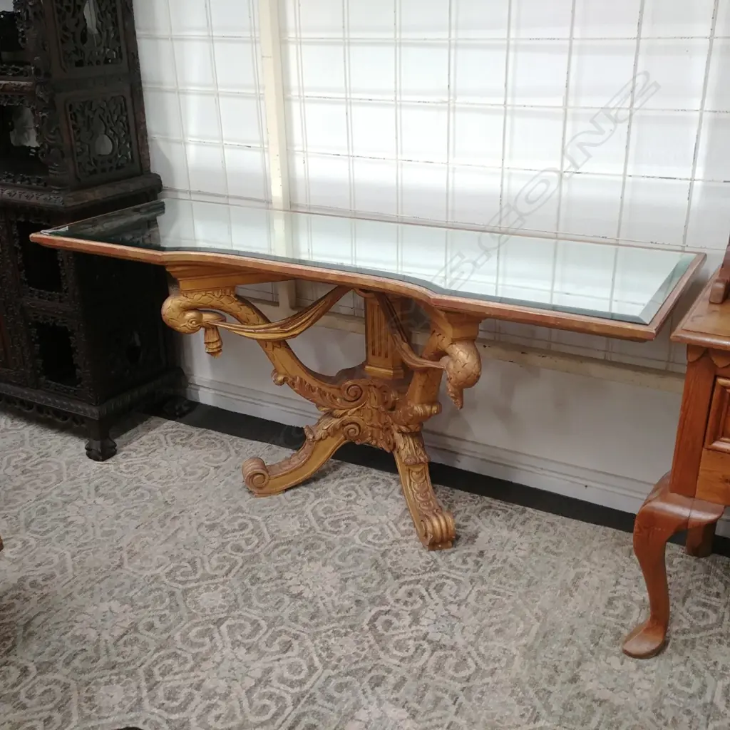 An ornate French style gilded and mirrored console table Image 1++