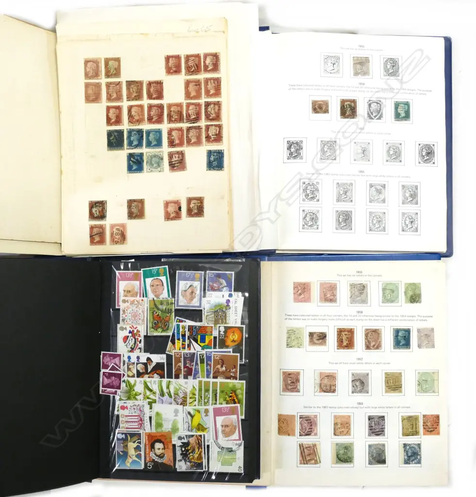 Four stamp albums Image 1++