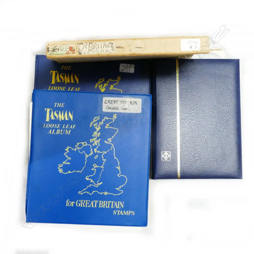 Four stamp albums Image 1++