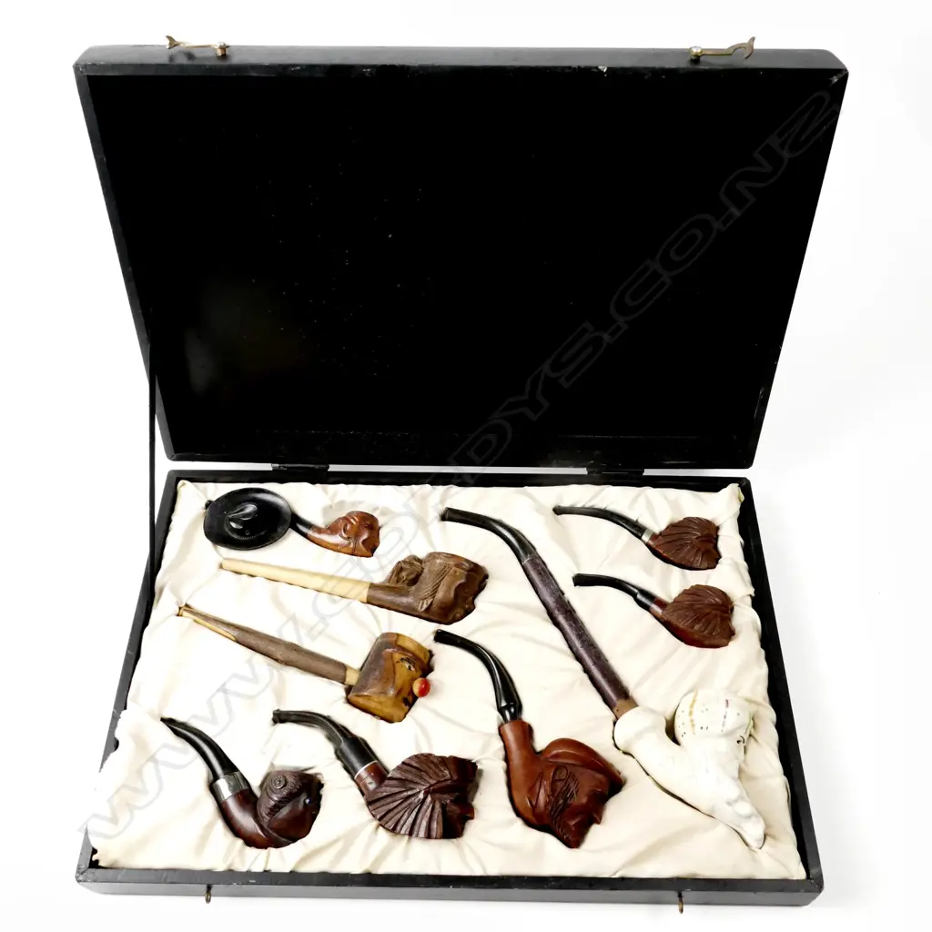 A collection of nine pipes Image 1++