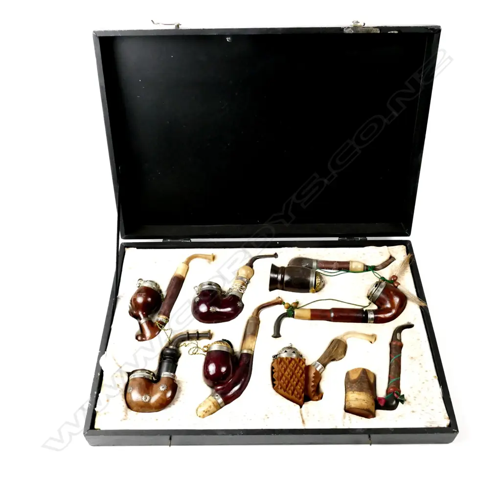 A collection of eight pipes Image 1++