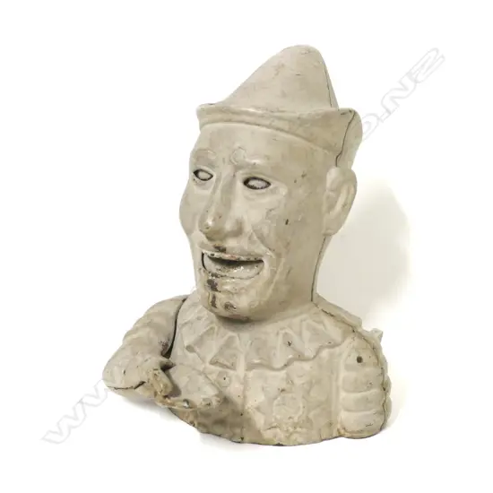 A vintage cast iron Humpty Dumpty money bank