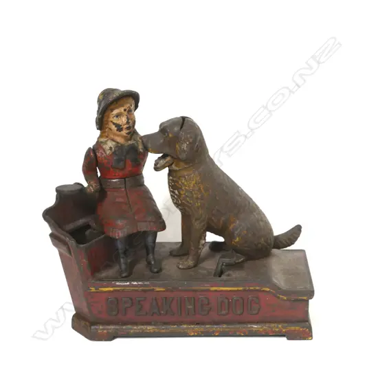 A vintage cast iron Speaking Dog money bank