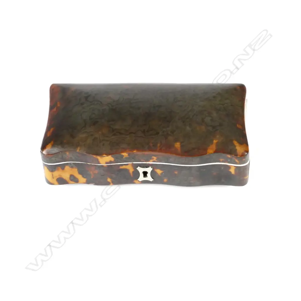 A Victorian tortoiseshell and ivory serpentine dressing table box Image 1++