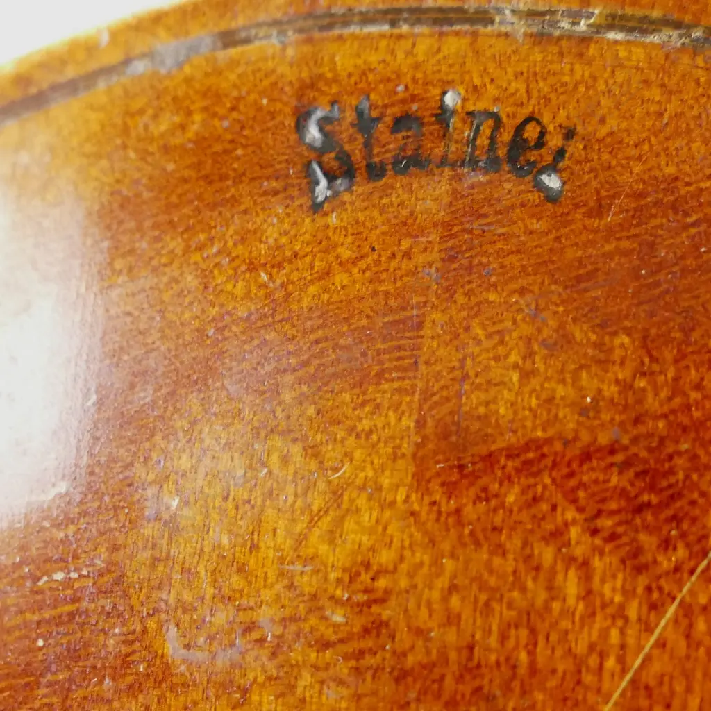 A small old violin Image 1++