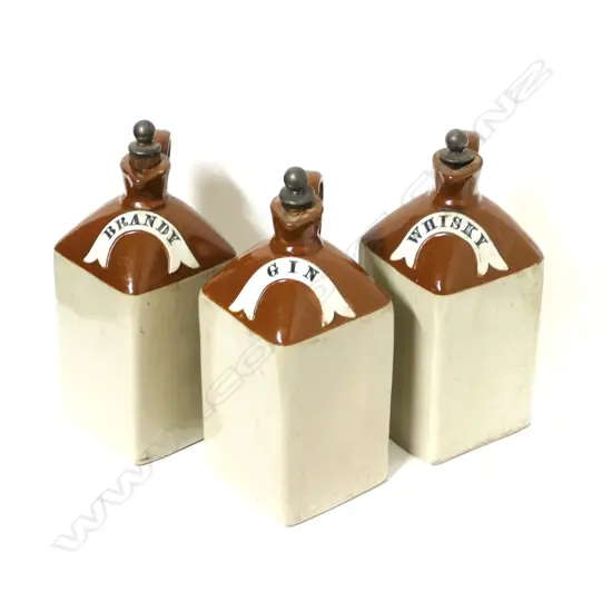 Three Victorian pottery spirit flasks