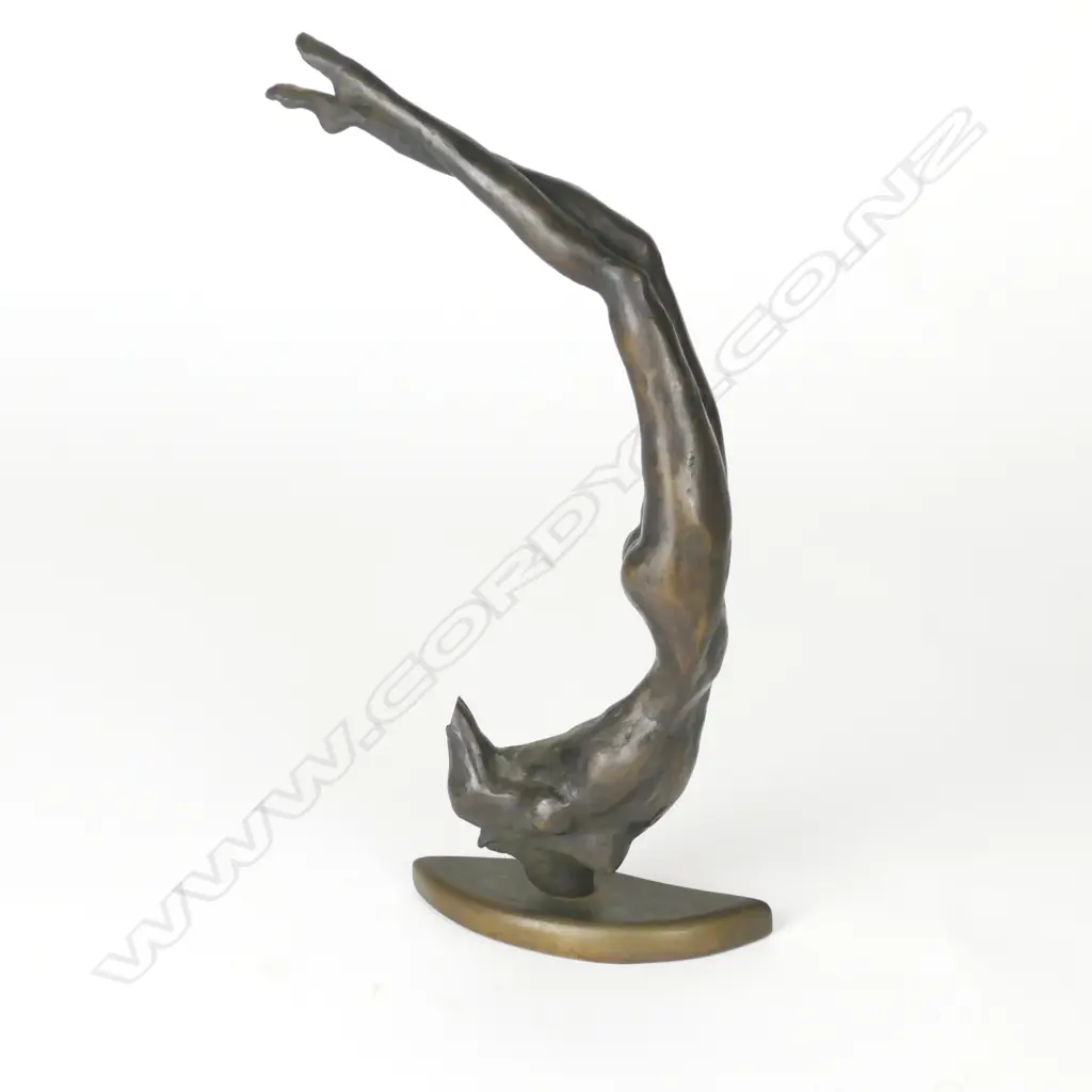 A bronze figure of a stylised acrobatic naked female figure Image 1++