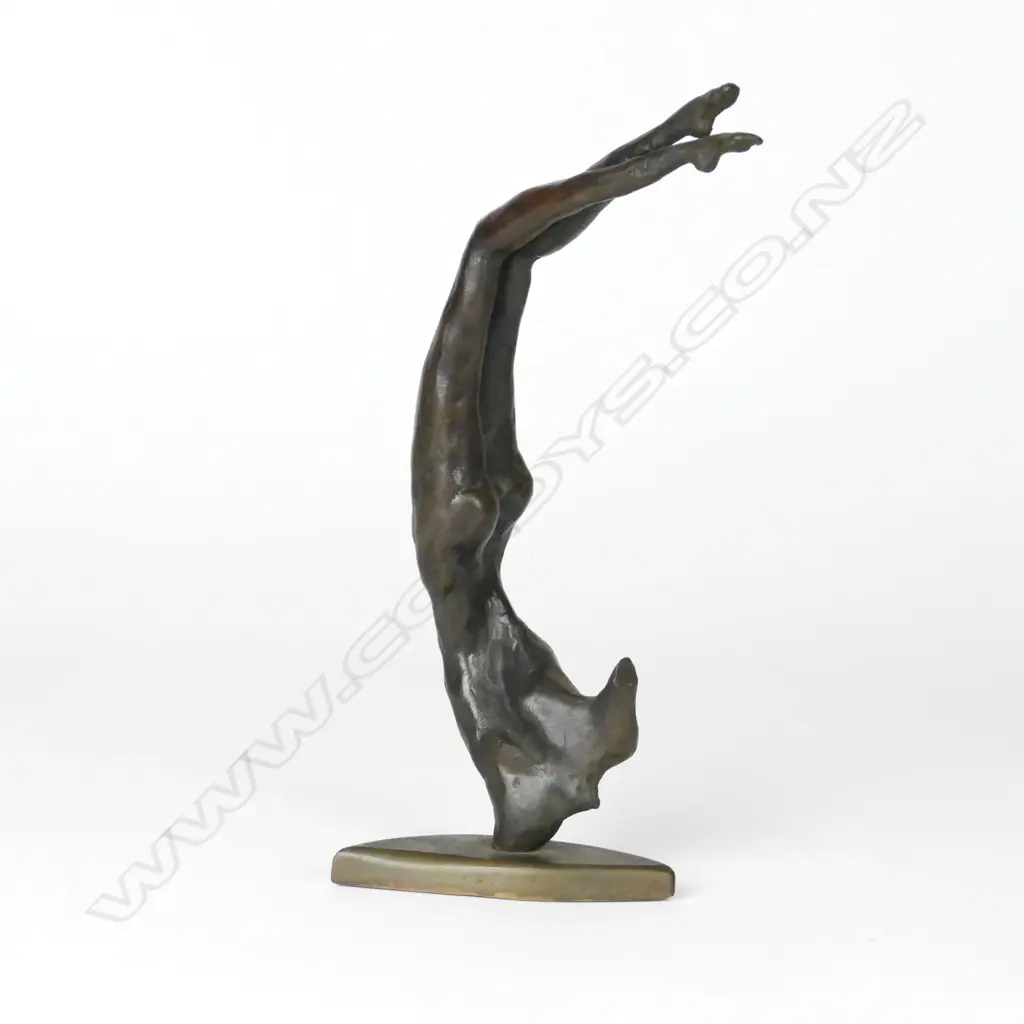 A bronze figure of a stylised acrobatic naked female figure Image 1++