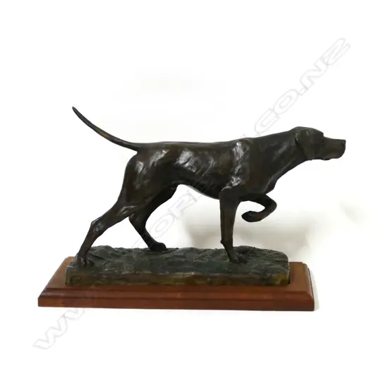 A bronze figure of a pointer dog