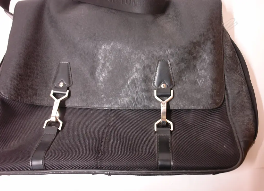 A vintage Louis Vuitton black epi-leather and canvas shoulder bag Image 1++