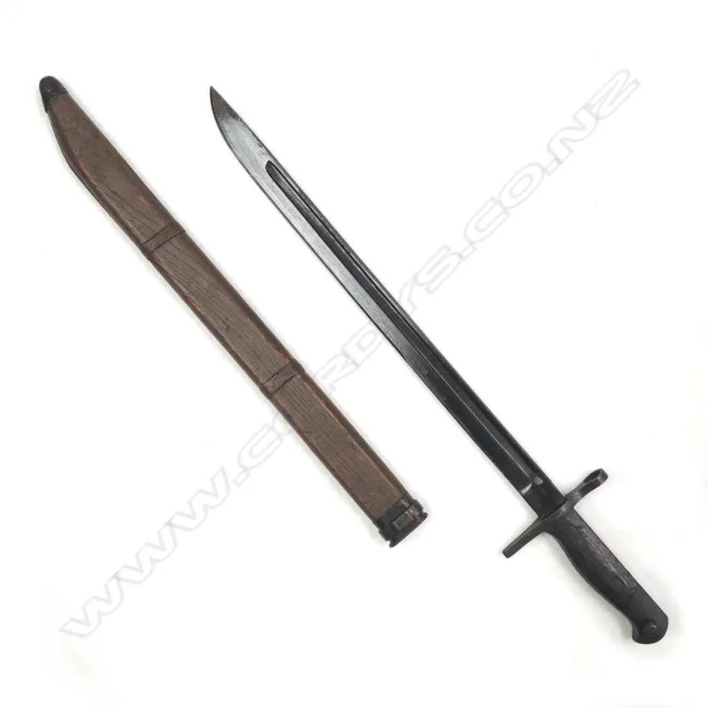 A Japanese WWII Type 30 1897 bayonet in scabbard Image 1++