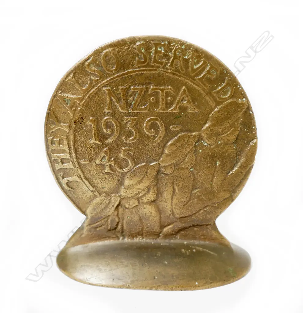 A prototype (?) bronze cast NZ paperweight Image 1++